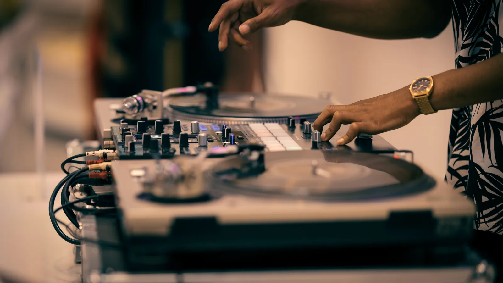 Hands working turntables