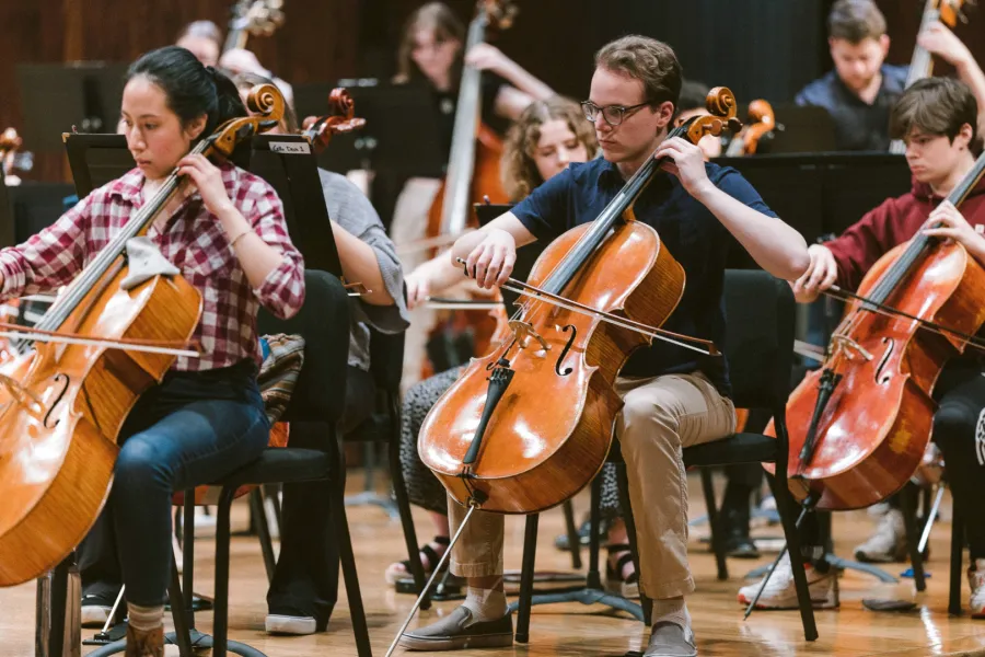 Cello players in rehearsal